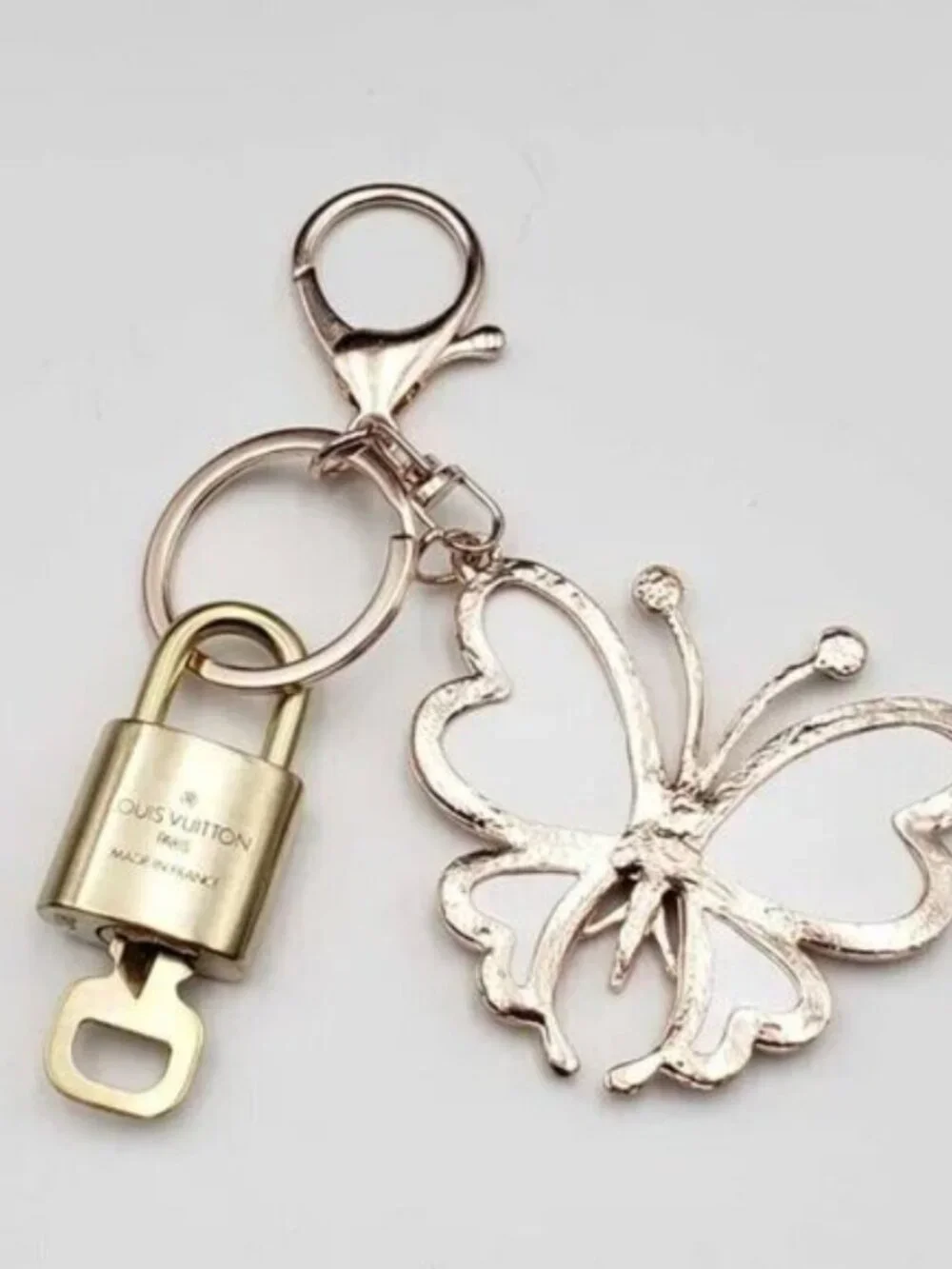 LV Authentic Gold Padlock 🔒 Key Set w/ Unbranded Butterfly Keychain Charm